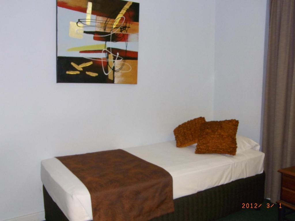 Coral Towers Holiday Suites Cairns Rum bild